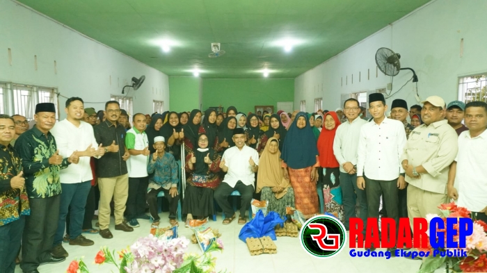 Pemerintah Kabupaten Kampar Serahkan Bantuan Sosial Bahan Pokok Di Desa Kualu, Kec.Tambang 